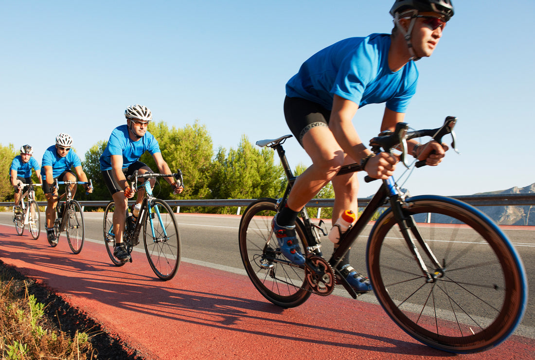Cyclists Competing at Cycling Event